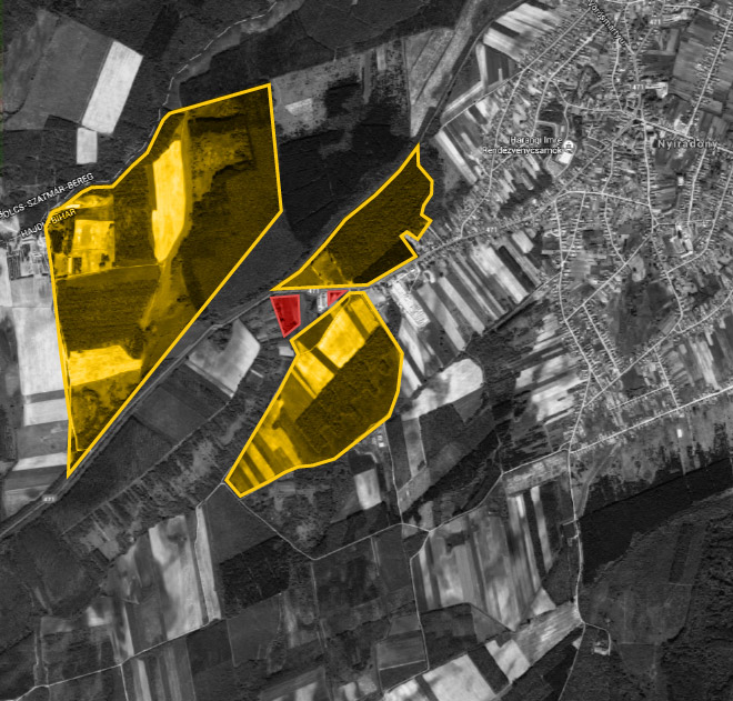 The yellow areas are the "intervention points" of the future industry park, in between them Tasó's parcels (in red)